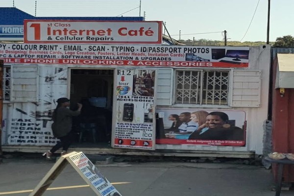 1st Class Internet Cafe $ Cellular Repairs