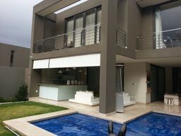 Deluxe Shutters and Awnings