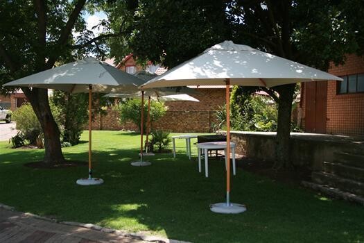 Sunny Skies Umbrella Rentals