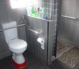 Immaculate Ground Floor Townhouse Designed for Person With Disability.